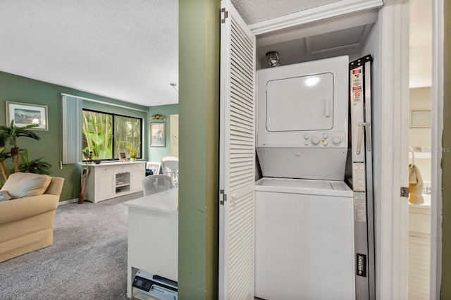 laundry room with carpet flooring, a textured ceiling, and stacked washer and dryer