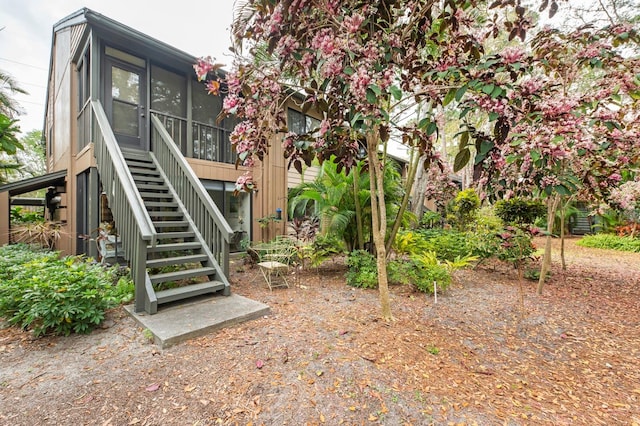 exterior space with a sunroom