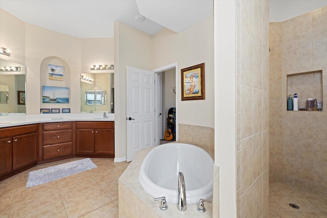 bathroom featuring vanity, tile patterned floors, and independent shower and bath