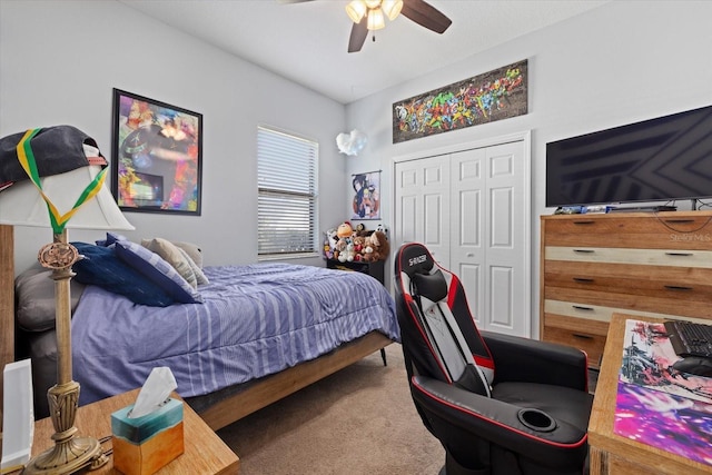 bedroom featuring ceiling fan, carpet floors, and a closet