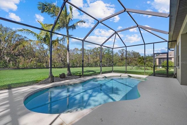 view of swimming pool featuring a lawn, a patio, and glass enclosure