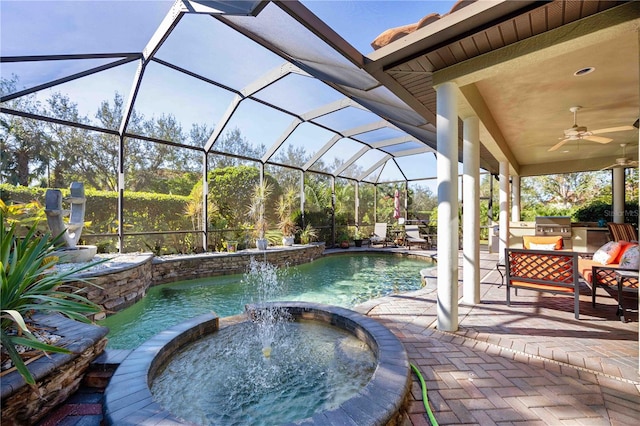 view of swimming pool with pool water feature, ceiling fan, an in ground hot tub, area for grilling, and a patio area