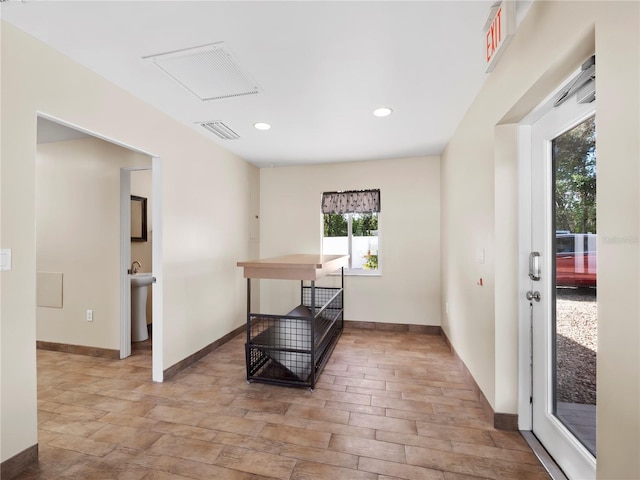 interior space with light hardwood / wood-style floors