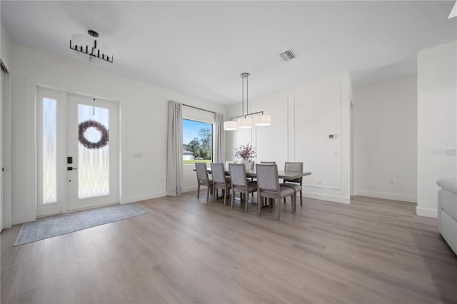 dining room featuring light wood-type flooring