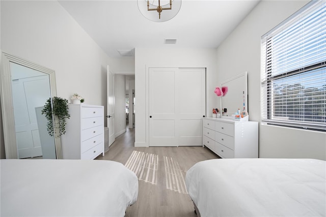 bedroom featuring light hardwood / wood-style floors