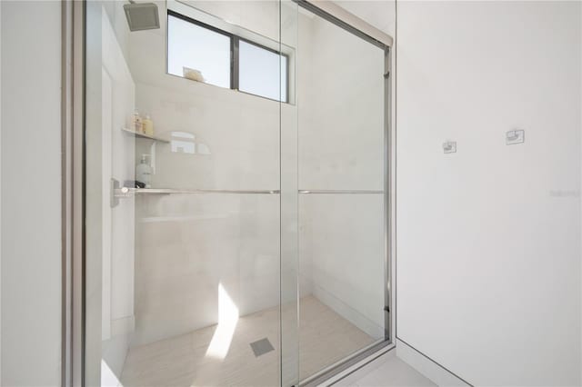 bathroom featuring an enclosed shower