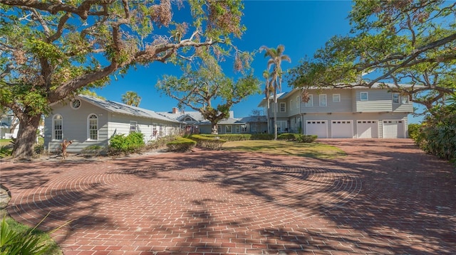 view of side of home with a garage