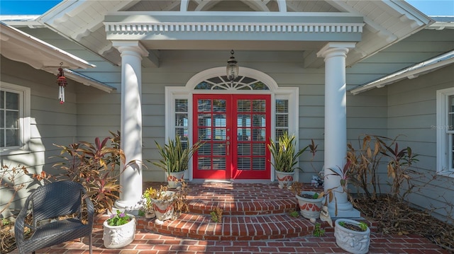 doorway to property featuring covered porch