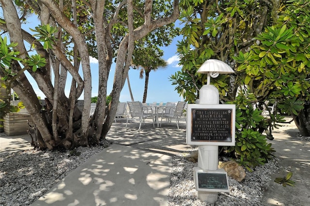 1249 S Basin Ln, Sarasota, FL 34242 - view of community with mail area and outdoor dining area