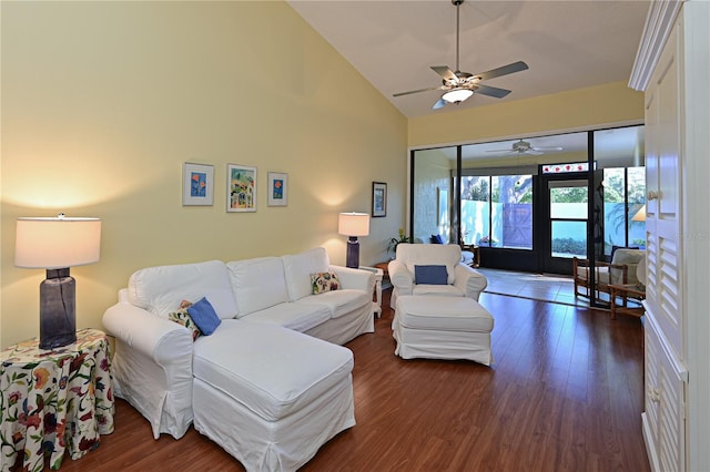 living room featuring french doors, lofted ceiling, ceiling fan, and dark wood-type flooring