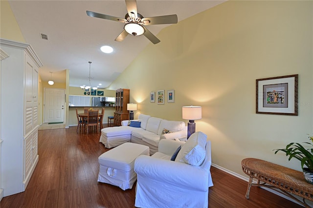 living room featuring high vaulted ceiling, dark hardwood / wood-style floors, and ceiling fan with notable chandelier