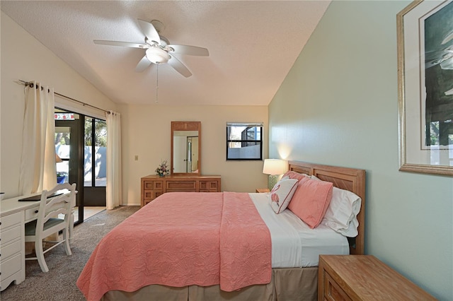 carpeted bedroom featuring access to outside, ceiling fan, a textured ceiling, and vaulted ceiling