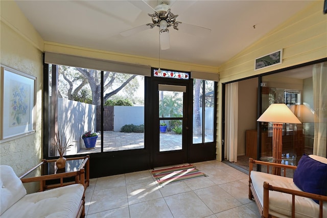 sunroom / solarium featuring ceiling fan and lofted ceiling