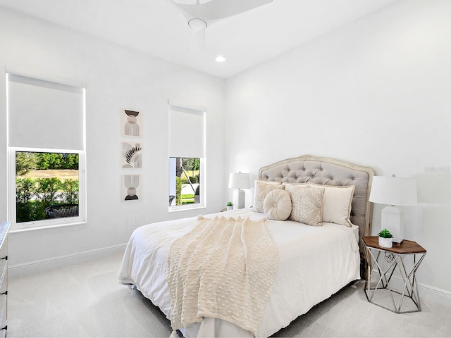 bedroom featuring ceiling fan and carpet floors