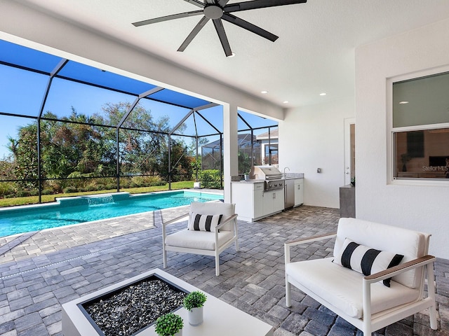 view of pool featuring area for grilling, a patio area, and glass enclosure