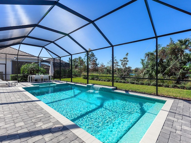 view of pool featuring a lanai and a patio area