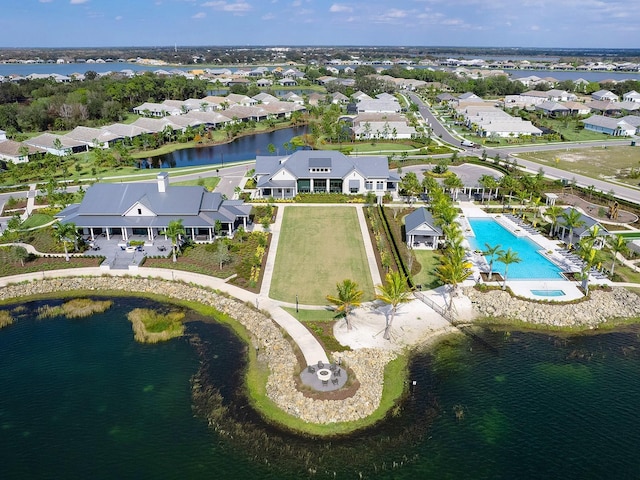 birds eye view of property featuring a water view