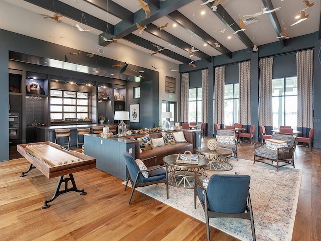 living room with light hardwood / wood-style floors