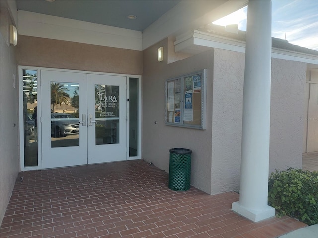 doorway to property with french doors