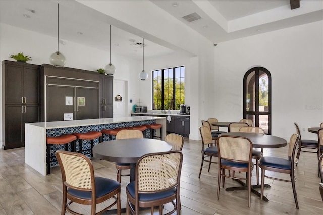 dining room with light wood-type flooring