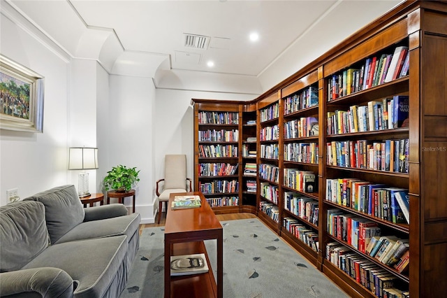 sitting room with hardwood / wood-style floors