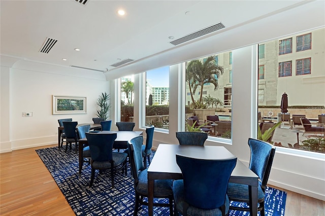 dining area featuring hardwood / wood-style flooring