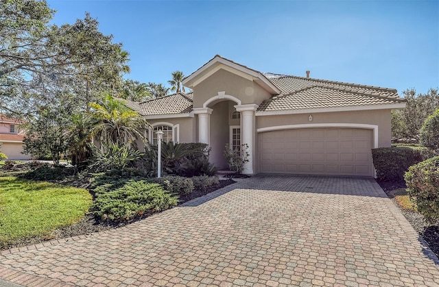 view of front of house with a garage