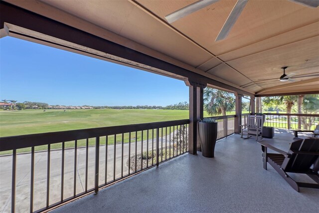 exterior space featuring ceiling fan