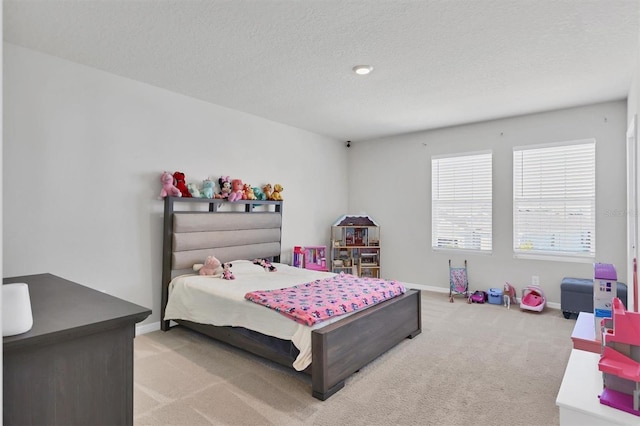 carpeted bedroom with a textured ceiling