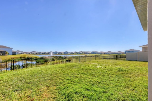 view of yard with a water view