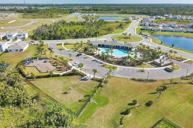 bird's eye view with a water view