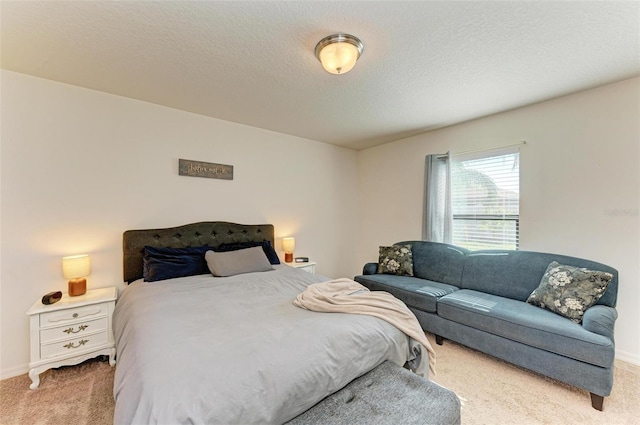 carpeted bedroom with a textured ceiling