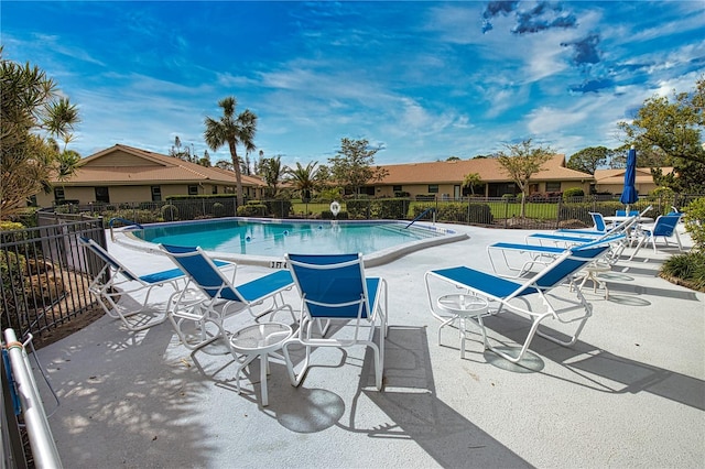 view of pool featuring a patio