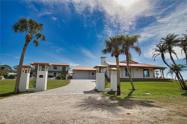 view of front facade with a front lawn