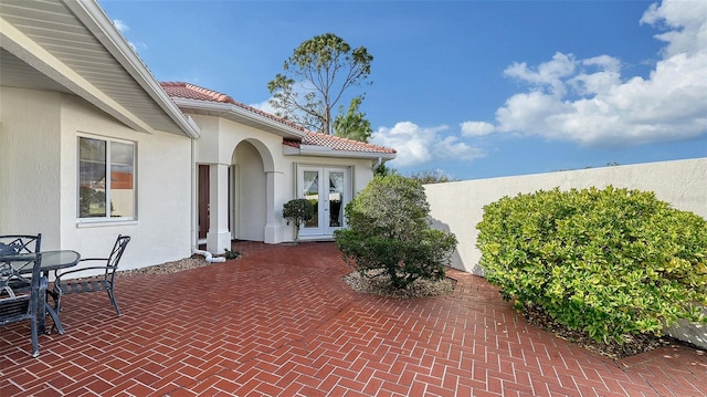 view of patio featuring french doors