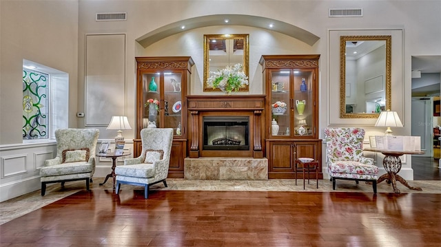 sitting room with hardwood / wood-style flooring