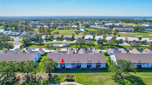 6713 Stone River Rd Unit 205, Bradenton, FL 34203 - aerial view of property and surrounding area featuring a golf course, nearby suburban area, and a large body of water