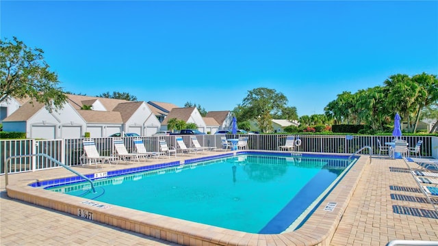 view of pool featuring a patio