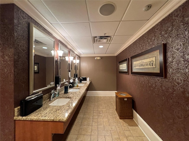 6713 Stone River Rd Unit 205, Bradenton, FL 34203 - bathroom with double vanity, crown molding, and a paneled ceiling