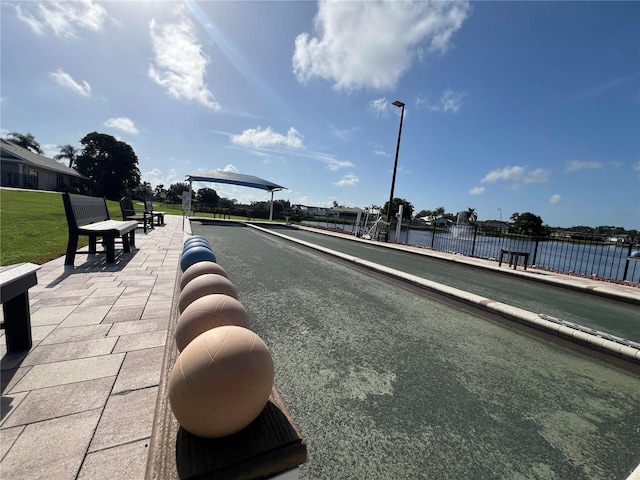 view of home's community with a water view