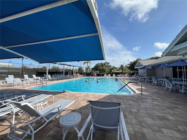 6713 Stone River Rd Unit 205, Bradenton, FL 34203 - community pool featuring a patio