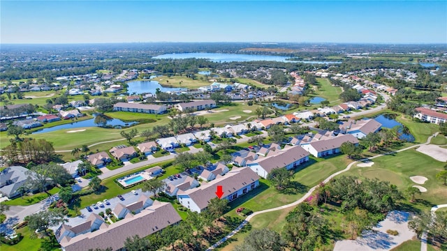 drone / aerial view with a water view