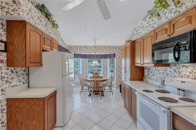 kitchen with ceiling fan, white appliances, a textured ceiling, and light tile patterned floors