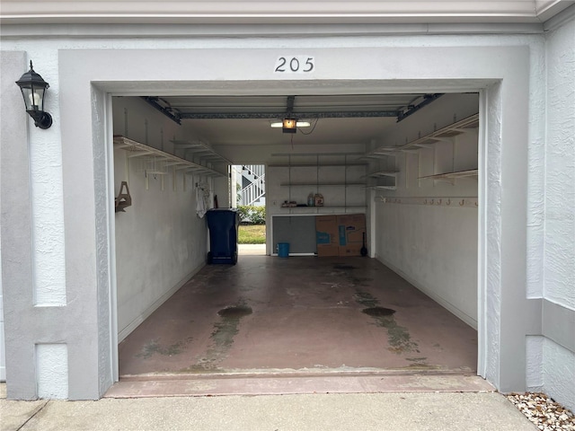 garage featuring a garage door opener