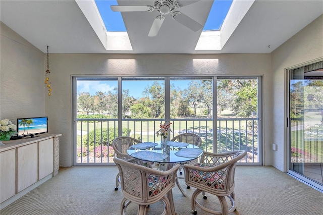 6713 Stone River Rd Unit 205, Bradenton, FL 34203 - sunroom with a skylight, carpet, healthy amount of natural light, and a textured wall