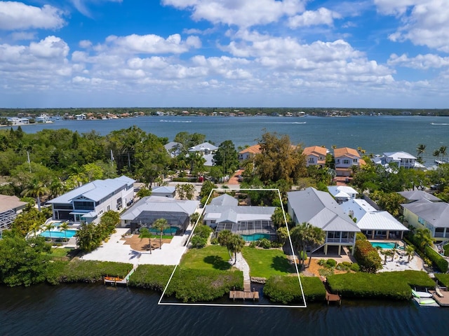 drone / aerial view with a water view