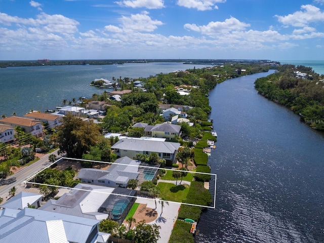 bird's eye view with a water view