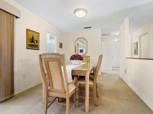 view of carpeted dining room