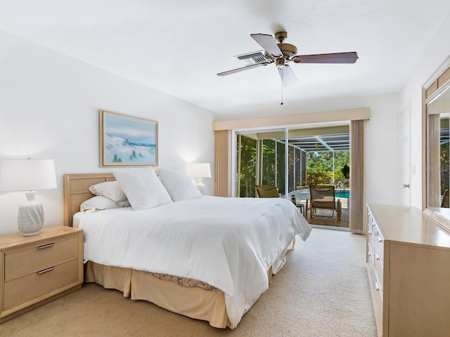 carpeted bedroom featuring ceiling fan and access to exterior