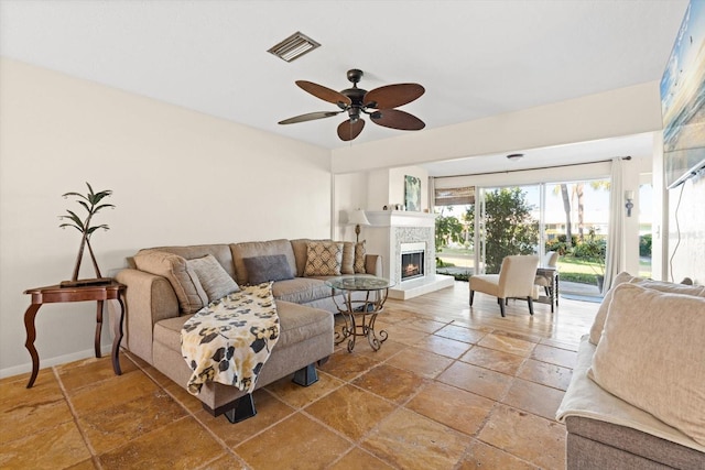 living room featuring ceiling fan